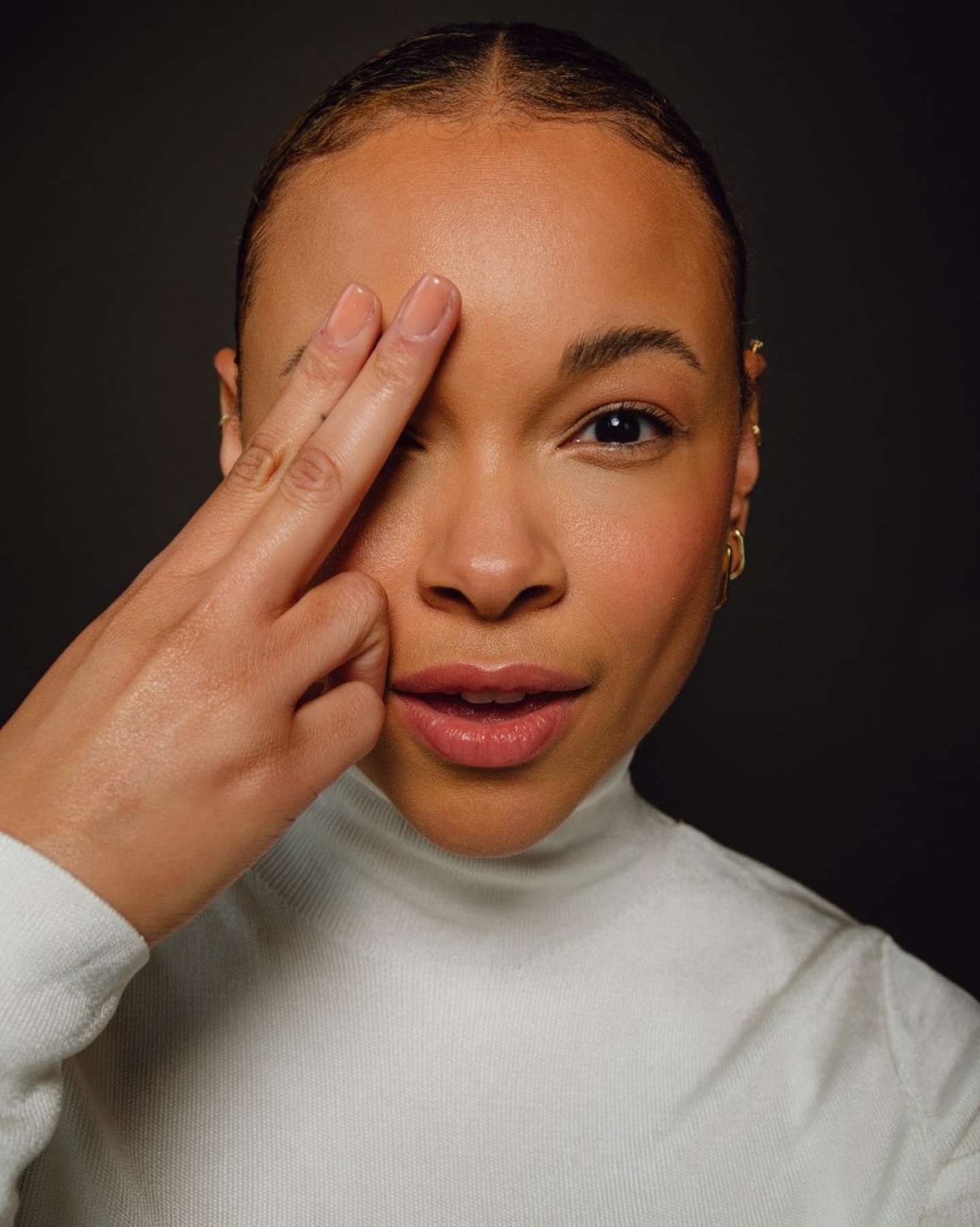 FEE beauty portrait with fingers near lips