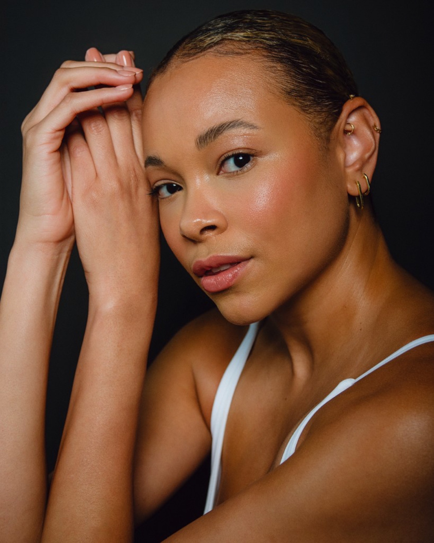 FEE beauty close-up with hands framing face